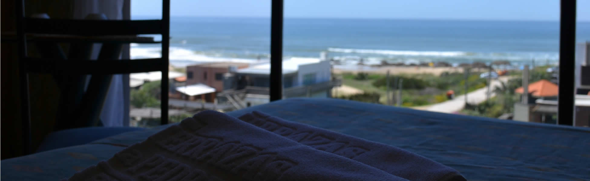 Vista para a praia desde a suíte do hotel